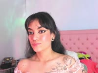 Hey, I’m the girl with the tattoos who loves to play. Whether I’m lounging in a cute outfit or getting sexy in black lace, I love exploring that space between sweet and wild. I’m here to let you into my world for a good time, with a little bit of spice and a lot of attitude.